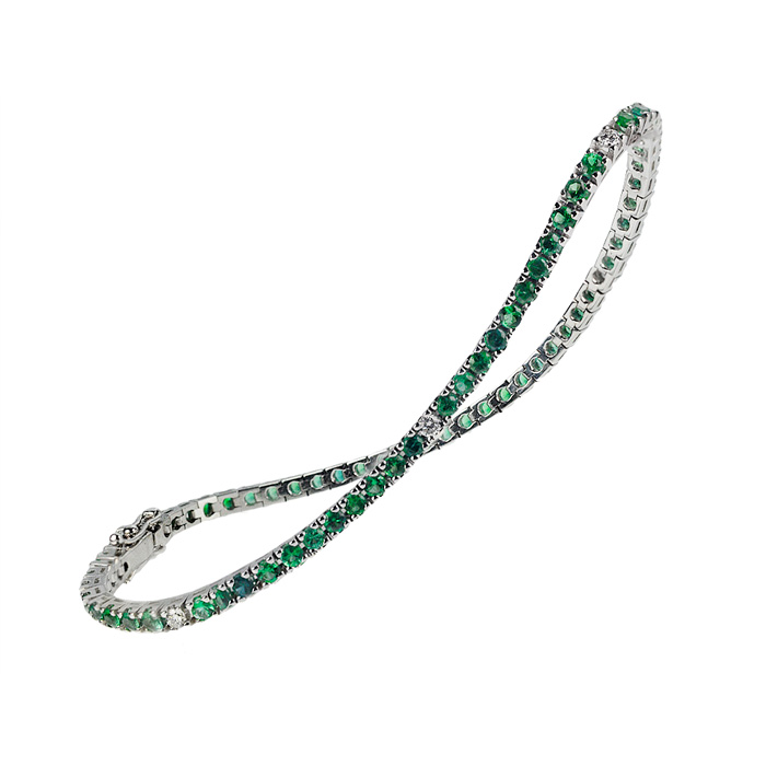 Tennis bracelet with diamonds and emeralds
