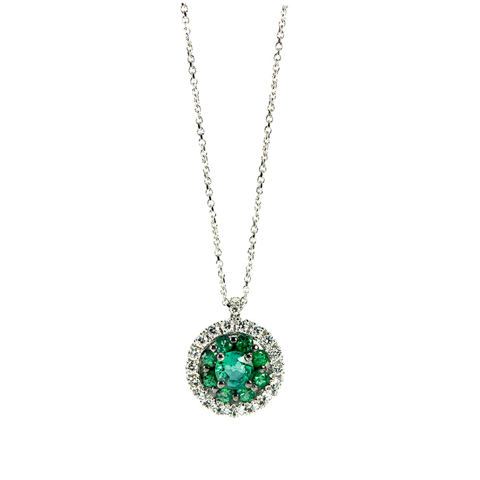 Pendant in withe gold with diamonds and emeralds